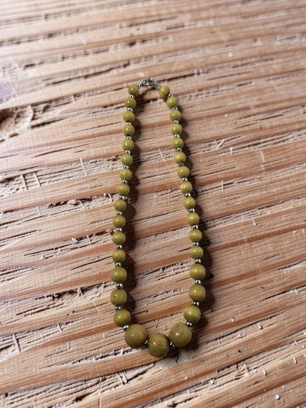 vintage polished olive wooden and silver metal beaded single row necklace